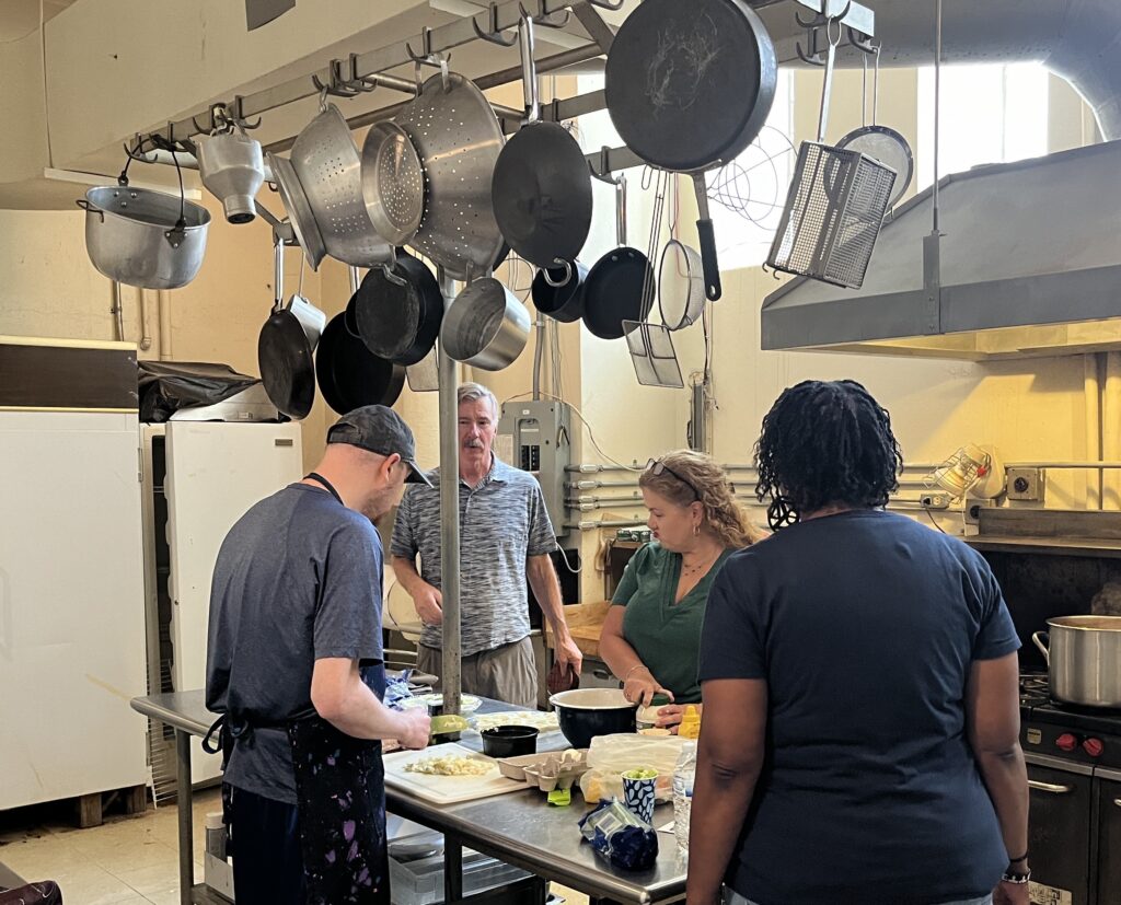 Friends got together to share and learn a favorite soup recipe. Spending time cooking in the kitchen and sharing a meal together.